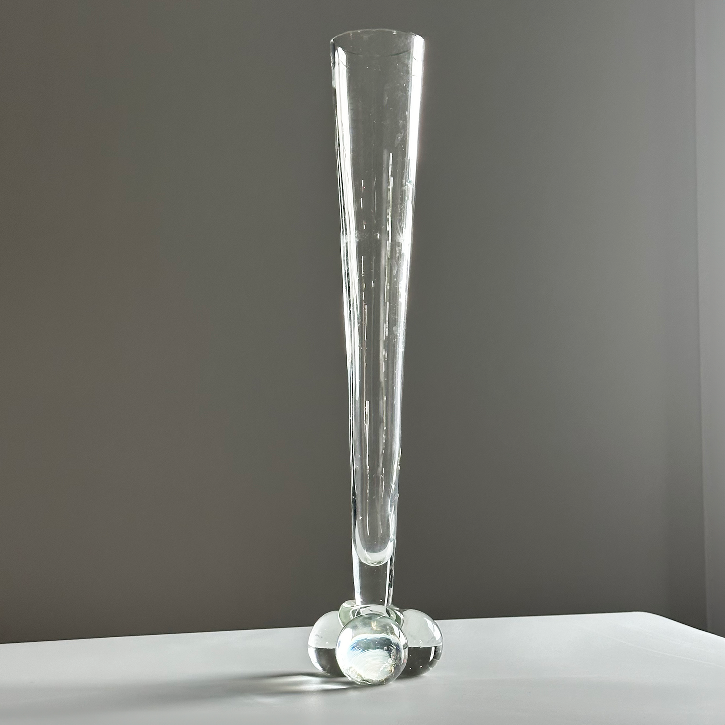 Elongated Glass Vase with Chunky Sphere Base